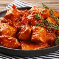 Chicken Tikka Masala · Boneless chicken breast sautéed with herbs and spices made to perfection.