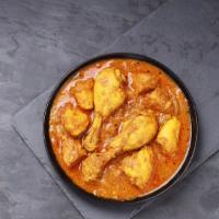 Chicken Curry · Amazing juicy chicken cooked with curry sauce and spices.
