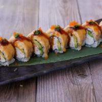 Baked Salmon Roll · Crab, avocado, topped with salmon baked in dynamite sauce.