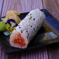 Spicy Salmon Hand Roll · Spicy salmon wrapped in soy paper.