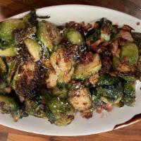 Brussel Sprouts · Sautéed sprouts, tossed with applewood bacon vinaigrette, house bacon crumbles, balsamic gla...