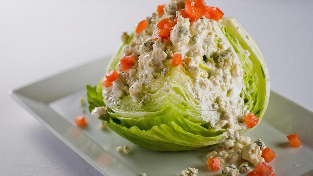 Iceberg Lettuce Wedge · Vine-Ripened Tomatoes, Blue Cheese Crumbles, Suggested Dressing - Blue Cheese Dressing