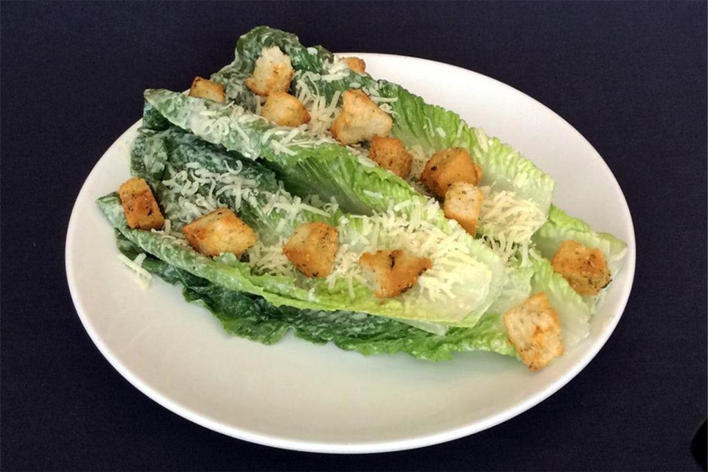 Caesar Salad · Heart of Romaine, Shaved Parmesan, Toasted Croutons, Suggested Dressing - Creamy Caesar Dressing