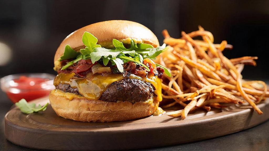 Sullivan'S Signature Beef Burger · Beef, Cheddar, Lettuce, Tomato, Pickle Sauce, Brioche Bun, Roasted Garlic Parmesan Fries
