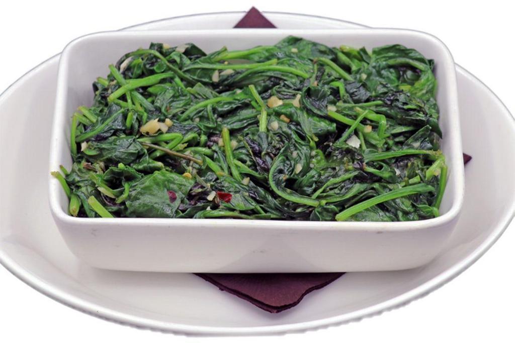 Sauteed Baby Spinach · Slightly Wilted, Roasted Garlic Oil, Red Pepper Flakes