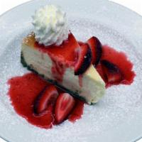 New York-Style Cheesecake · Graham Cracker Crust & Fresh Strawberries