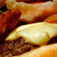 Chili Cheeseburger · Fresh 1/3 lb. Beef patty topped with cheddar cheese and chili.