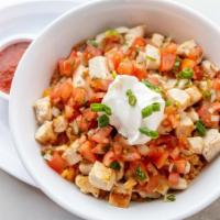 Fiesta Bowl · Chicken or carnitas, spanish rice, refried beans, pico de gallo, sour cream and salsa.