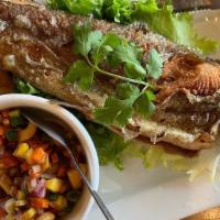 Mango Trout · Deep fried whole rainbow trout served with mango salad sauce.