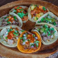 Street Tacos · Choice of meat, cilantro, onions and salsa served on a corn tortilla. Make it protein style ...
