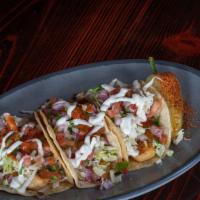 Bajaway · Choice of grilled or beer battered fish or shrimp, pico de gallo, cabbage, salsa and white h...