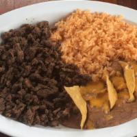 Carne Asada · A steak prepared mexican-style, topped with sautéed onions and bell peppers. Served with ric...