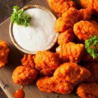 Buffalo Boneless Fries · Delicious fries with boneless wings, cheese, and ranch.