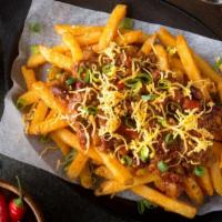 Chili Cheese Fries · Crispy, crunchy golden fries covered with melted cheese and zesty chili.