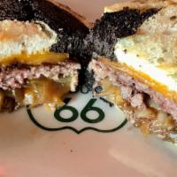 Patty Melt Burger · 1/3 lb burger, Grilled onion, cheddar cheese, on a toasted marbled rye loaf.
Served with a c...