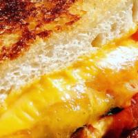 4 Cheese Grilled Cheese Sandwich · Our 4 Cheese Grilled Cheese, with American, Jack, Swiss and Cheddar.  Yum yum yum!