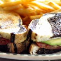 Avocado Melt · Served on marbled rye loaf. Avocado, grilled onion, tomato jack.  (this item does not come w...