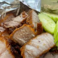Pork Belly · Deep-fried seasoned pork belly with cucumbers on the side. Served with jeow som and vinegar-...