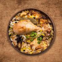 United Chicken Biryani · (24 Oz.) Tender morsels of chicken meat cooked with our signature biryani masala gravy and l...