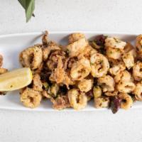 Crispy Calamari · Fried Calamari Chili Flake, Mixed Olives, Caper Tarter.