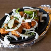 Chicken Tikka · Chicken cubes (boneless-white meat) marinated with yogurt and Indian spices.
