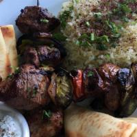 Lamb Kabob Plate · Marinated lamb, bell peppers, onions, grilled pita, lemon herb, rice.