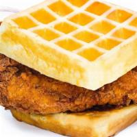 Chicken & Waffle Sandwich · Fried chicken breast served on buttermilk waffles with a side of waffle syrup