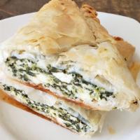 Spanakopita (Vegetarian) · Spinach, feta and egg wrapped in phyllo dough and baked. Spinach pie.