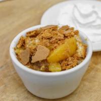 Homemade Peach Cobbler · With whipped cream.