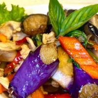 Eggplant · Sautéed eggplant with garlic, carrot, bell peppers, onion, and basil.