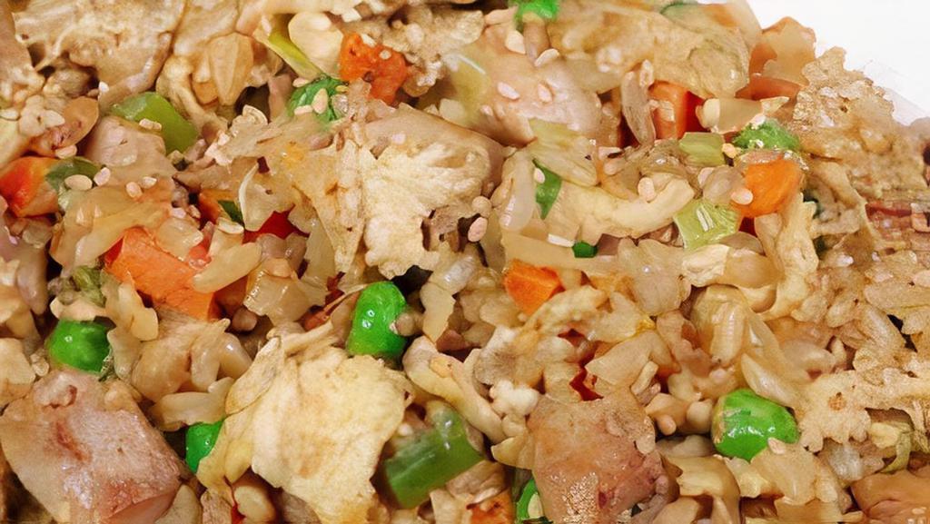 Chicken Fried Rice · Rice, peas, carrots, egg, scallions, chicken.