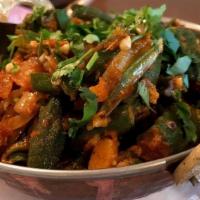 #17. Bhindi Masala · Okra cooked with tomatoes and spices.