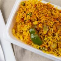 #28. Vegetable Biryani · Marinated vegetables cooked with rice.