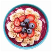 Dragon Fruit Bowl · Pitaya, banana, mango, blueberry, strawberry, pineapple, granola, coconut, and honey.