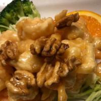 Honey Walnut Shrimp · Shrimp fried in light batter with marinated in chef's special sauce with bed of broccoli.
