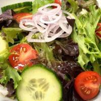 House Green Salad · Spring Salad mix, tomatoes, cucumber, Yuzu soy dressing.