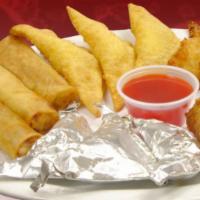 Mix Platter · Our appetizer sampler. 
Comes with three each of vegetable egg rolls, chicken wings, fried c...