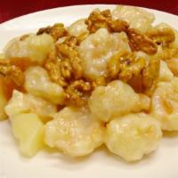 Honey Walnut Shrimp · Fried shrimp topped with our creamy sauce, candied walnuts, and pineapples.