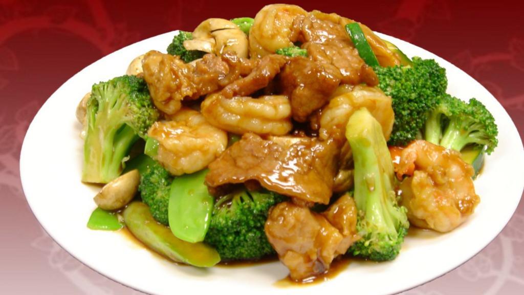 Four Seasons · Stir-fried chicken, beef, and shrimp with our mix of vegetables consisting of cabbage, broccoli, mushroom, carrots, and zucchini in a savory sauce.