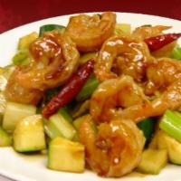 Kung Pao Shrimp · Stir-fried shrimp with zucchini and celery in a savory and spicy sauce. Topped with peanuts....