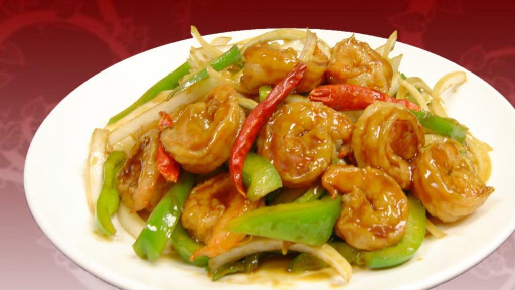 Szechuan Shrimp · Stir-fried shrimp with bell peppers and yellow onions in a savory and spicy sauce.  spicy