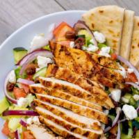Greek Salad · Mixed greens tossed with Greek dressing, tomatoes, cucumbers, feta, kalamata olives, onions,...