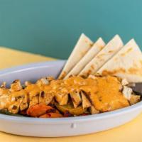Greek Bowl · Seasoned basmati rice, roasted vegetables, grilled chicken or hand-carved gyro, topped with ...