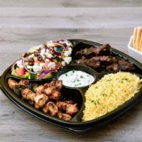 Family Feast 4Ppl · Serves 4. Pick 2 proteins and 2 sides. Includes warm pita bread and your choice of sauce.