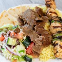 Mix & Match Plate · Your choice of two proteins served with roasted veggies, seasoned basmati rice, choice of hu...