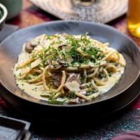 Bucatini In Crema Di Funghi + Spinaci · mushroom, spinach, roasted garlic, cream + basil