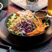 Insalata Di Pollo Chinese · grilled chicken, red onion, wontons, peanuts, peas, red cabbage, carrots, sesame seeds, hois...