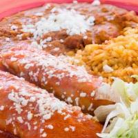 Tamales Plate (2) · Pork and chicken.