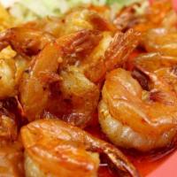 Camarones Ala Kora · Deep-fried shrimp with lime peppers and seasoned sauce.