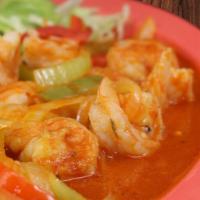 Camarones Rancheros · Mexican style shrimp served with red and green bell peppers, red sauce, onions, rice, refrie...
